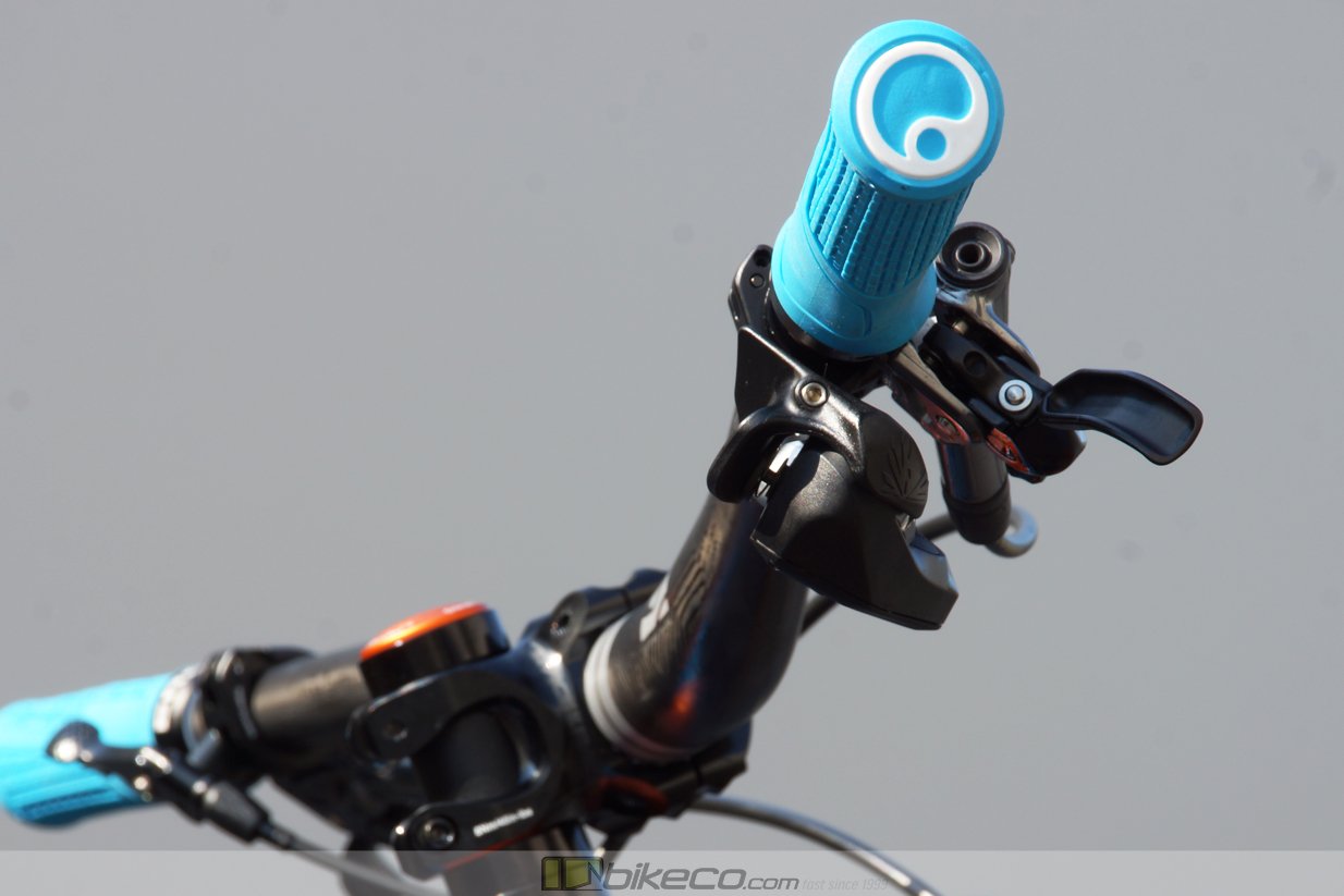 Detail of Ergon grips and SRAM AXS shift controller on Ibis Ripmo